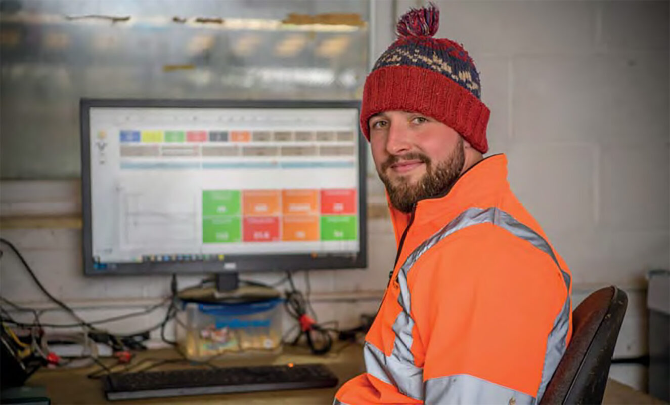 Oli Mears of Bisterne Farm planning at his desk